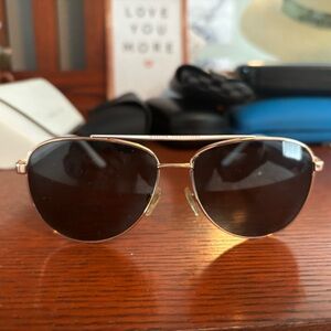 Micheal Khors prescription sunglasses frames.